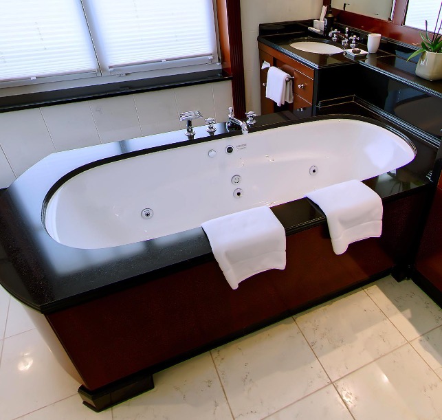 Freestanding whirlpool tub in the bathroom